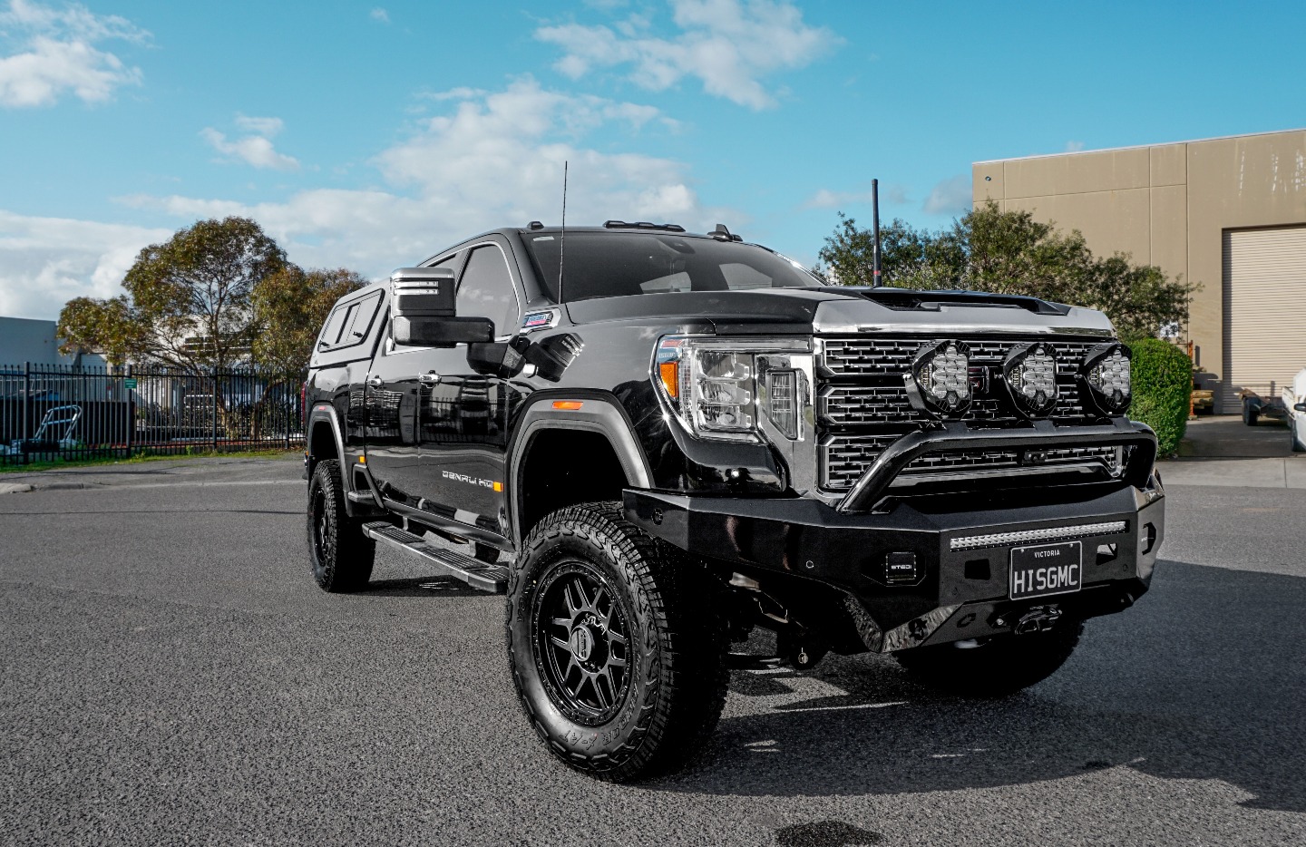 Customised GMC 2500 with bull bar, lights and lift kit